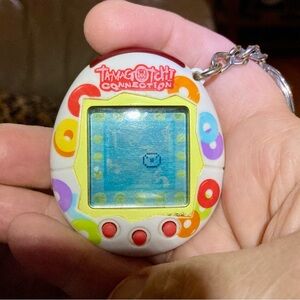 Tamagotchi Connection 2004 White With Colorful Donut Shapes